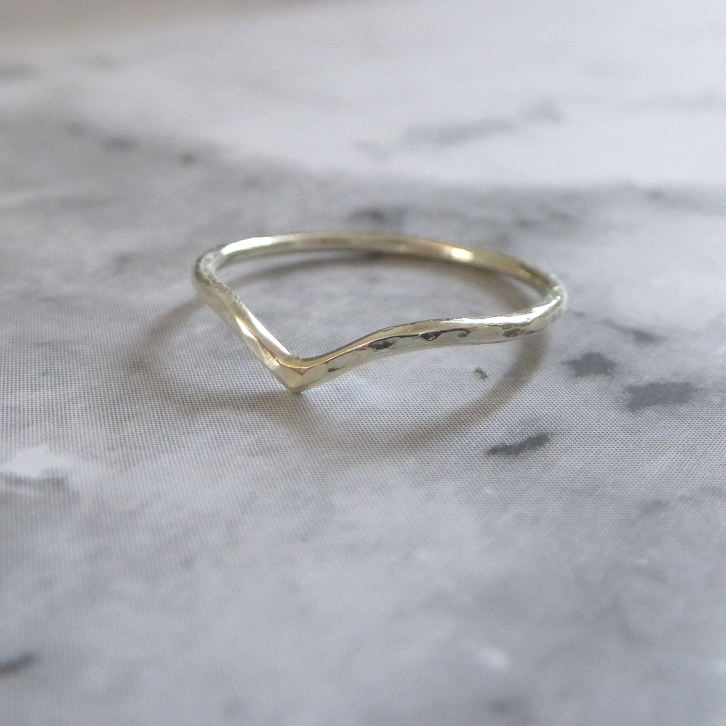 1.2mm wishbone in 9ct white gold, hammered finish