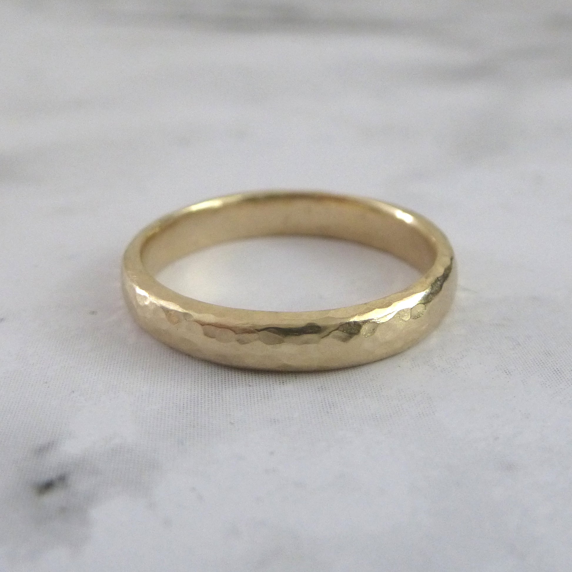3mm band in hammered 9ct yellow gold, recycled gold wedding band