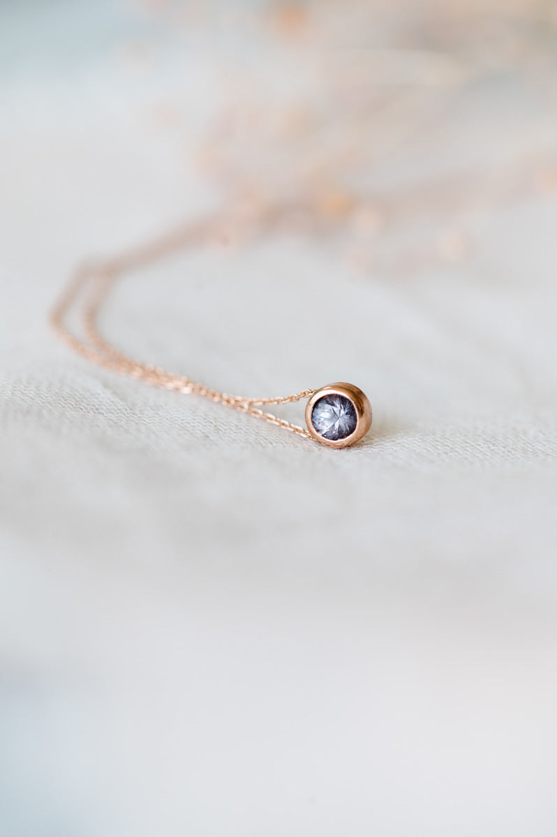 Purple spinel solitaire necklace in 9ct rose gold