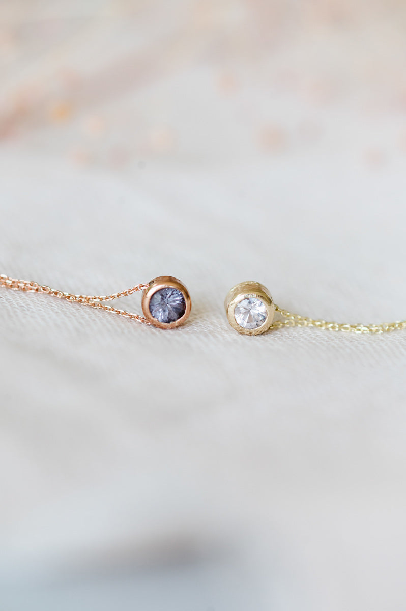 Purple spinel solitaire necklace in 9ct rose gold