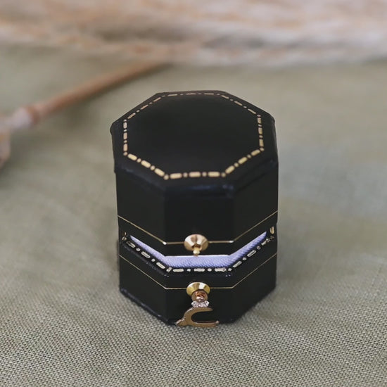 An 18ct gold wishbone ring, in a box