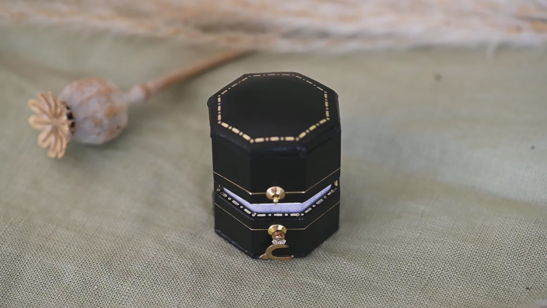 An 18ct gold wishbone ring, in a box