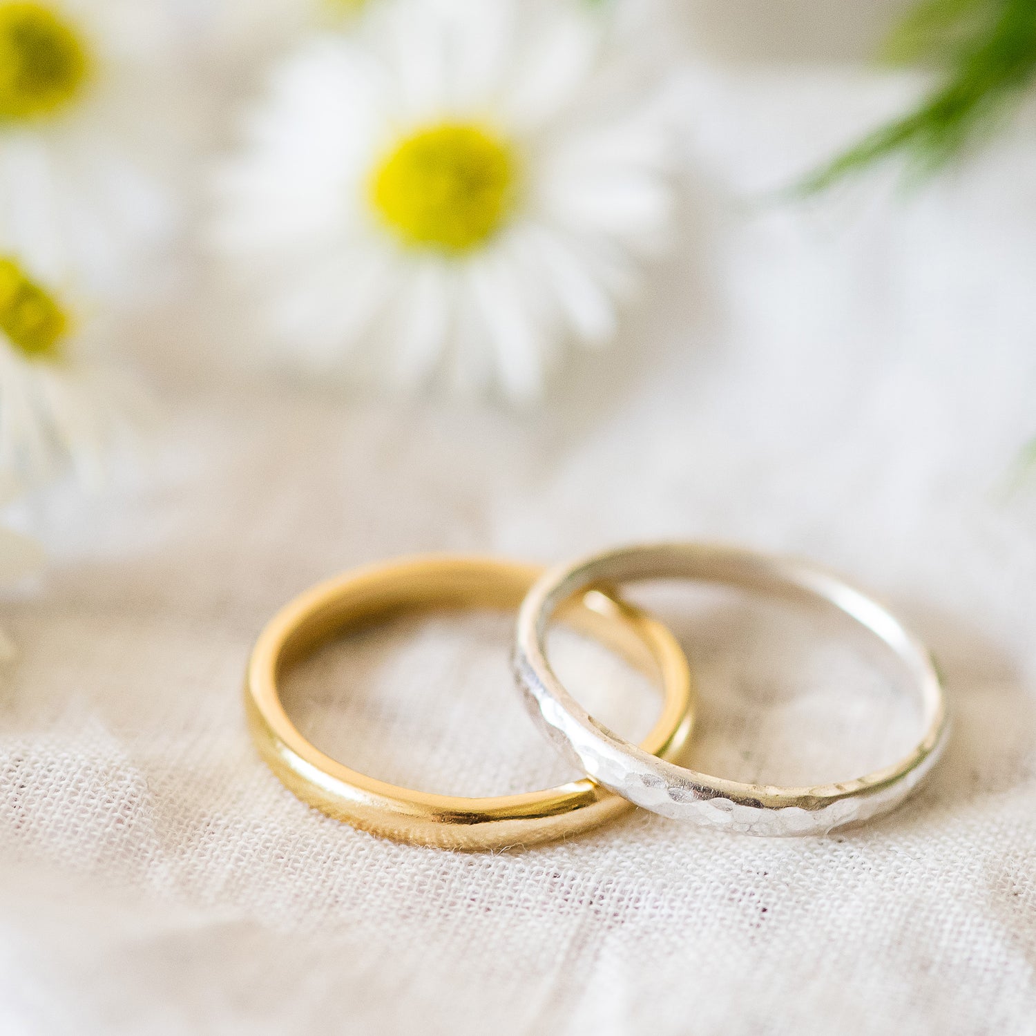 18ct yellow gold D shaped wedding band, also pictured with a hammered sterling silver band
