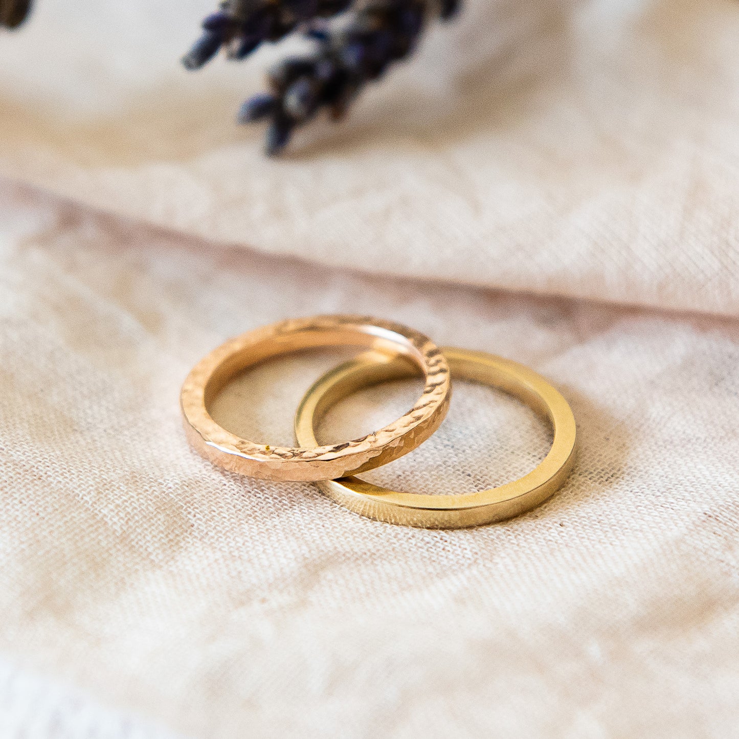 two square profile bands in recycled gold, 9ct rose gold hammered and 9ct yellow gold smooth