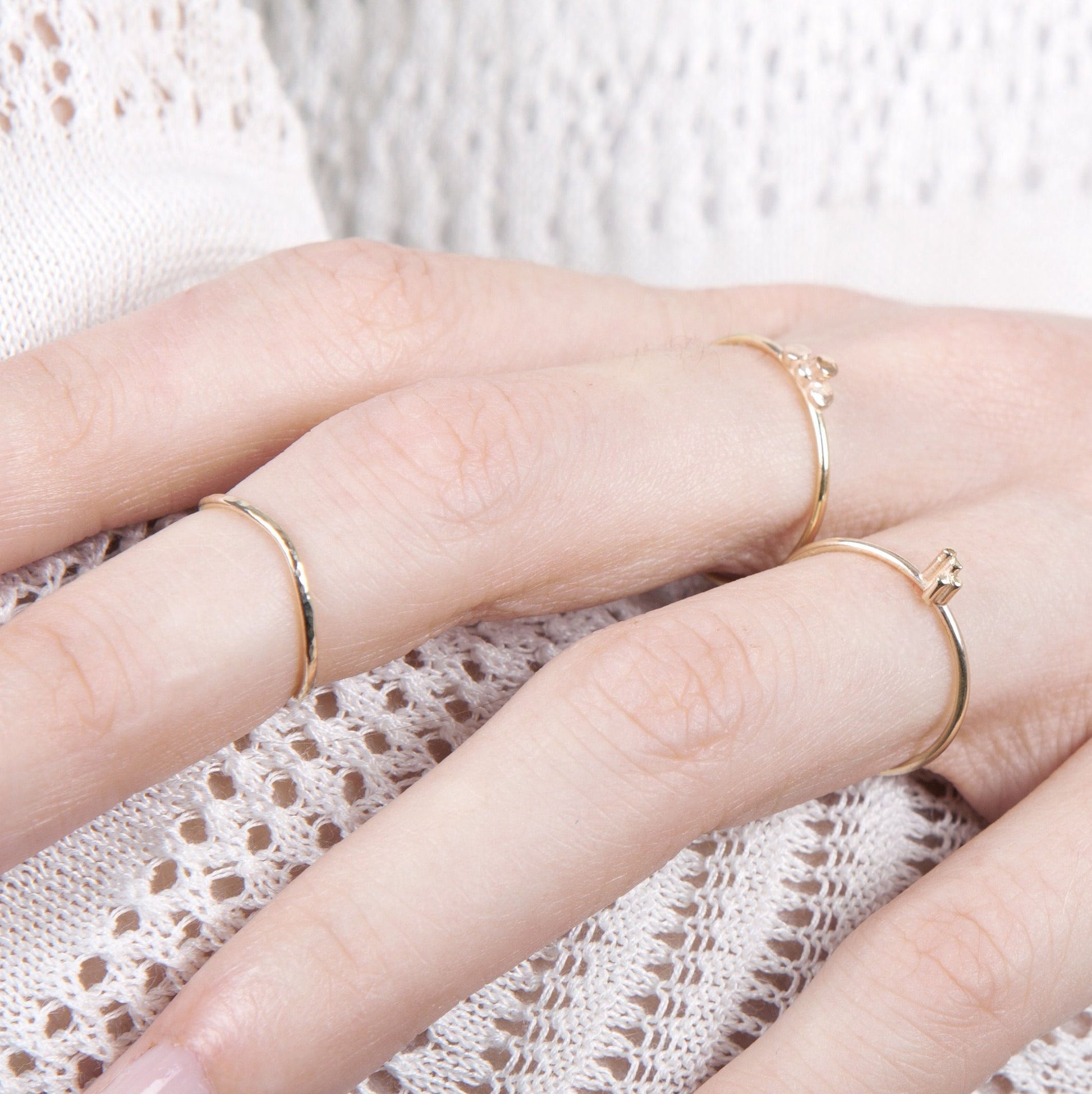 Thin gold rings close up