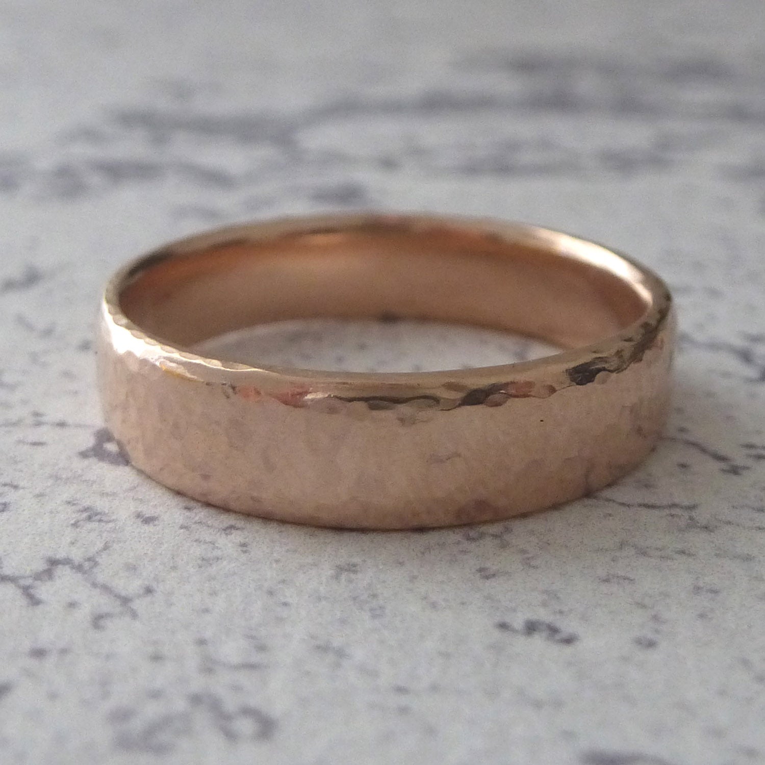 5mm 9ct rose gold hammered wedding ring, soft court shape